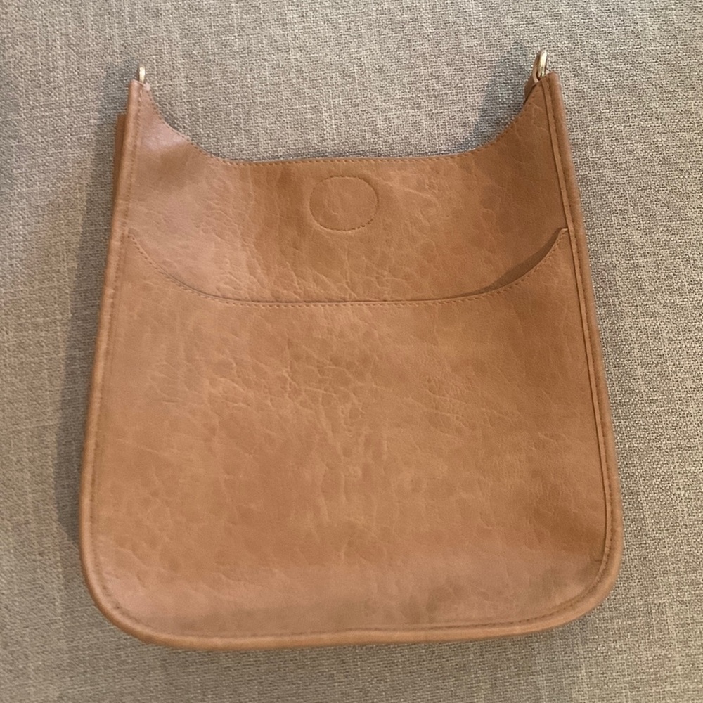 Ahdorned brown purse